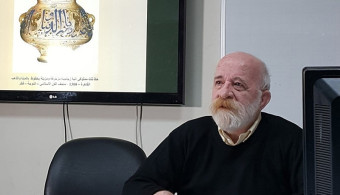 The Arab International University hosts a lecture by the artist and calligrapher Munir Shaarani