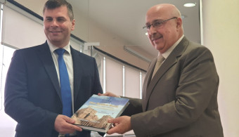 A lecture entitled “The Strategy for the Rehabilitation of the Damaged Historic Cities - Old Aleppo.” A model in the College of Architecture